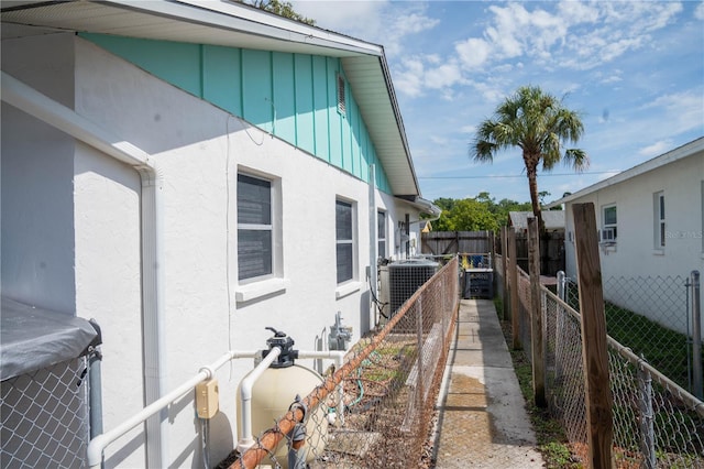 1004 65th Ave W, Bradenton, FL 34207 - view of home's exterior with board and batten siding and stucco siding