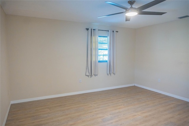 1004 65th Ave W, Bradenton, FL 34207 - unfurnished room featuring light wood-style flooring and a ceiling fan