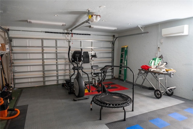 1004 65th Ave W, Bradenton, FL 34207 - garage with a wall unit AC, a textured wall, and a garage door opener