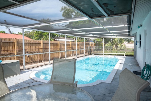 1004 65th Ave W, Bradenton, FL 34207 - view of pool featuring a fenced backyard, a patio area, and glass enclosure