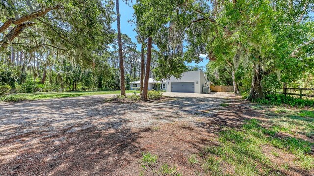 6990 Richardson Rd, Sarasota, FL 34240 - view of front facade featuring stucco siding