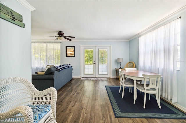 3102 SE 34th Ave, Okeechobee, FL 34974 - dining space featuring french doors, wood finished floors, crown molding, a ceiling fan, and baseboards