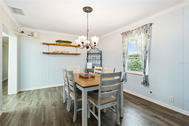 3102 SE 34th Ave, Okeechobee, FL 34974 - dining space featuring wood finished floors, a chandelier, ornamental molding, and baseboards