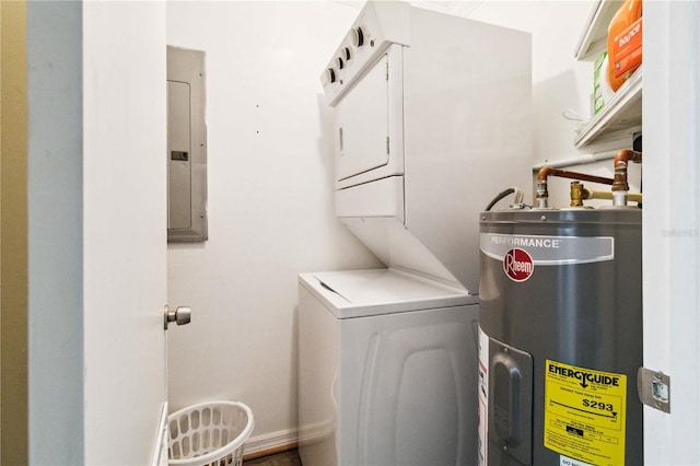 3102 SE 34th Ave, Okeechobee, FL 34974 - laundry area with water heater, stacked washing machine and dryer, and electric panel