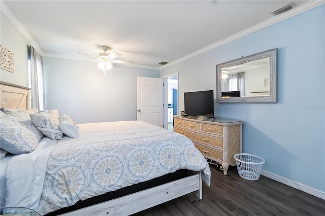 3102 SE 34th Ave, Okeechobee, FL 34974 - bedroom with wood finished floors, crown molding, baseboards, and ceiling fan