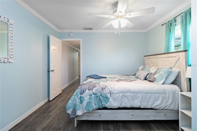 3102 SE 34th Ave, Okeechobee, FL 34974 - bedroom with crown molding, wood finished floors, baseboards, and ceiling fan