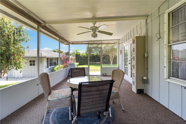 3102 SE 34th Ave, Okeechobee, FL 34974 - sunroom featuring french doors, ceiling fan, and outdoor dining space