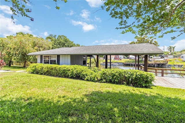 3102 SE 34th Ave, Okeechobee, FL 34974 - view of home's community featuring a yard, a water view, a boat dock, and boat lift