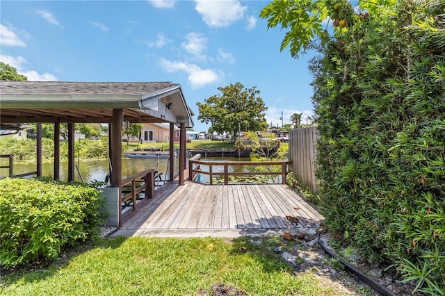 3102 SE 34th Ave, Okeechobee, FL 34974 - wooden deck with a water view and a boat dock