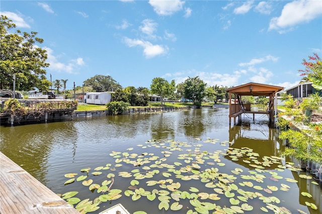 3102 SE 34th Ave, Okeechobee, FL 34974 - dock area featuring a water view and a gazebo