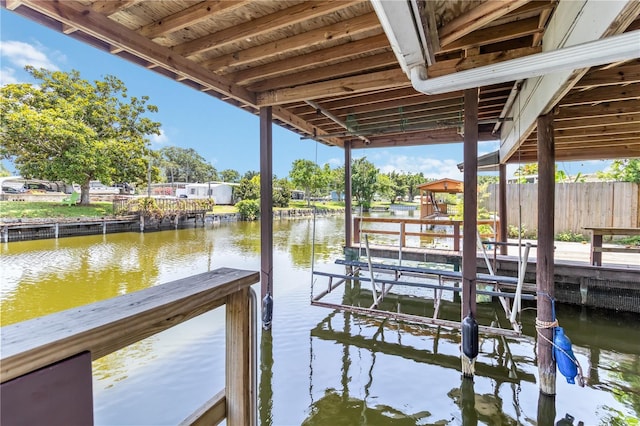 3102 SE 34th Ave, Okeechobee, FL 34974 - dock featuring a water view and boat lift