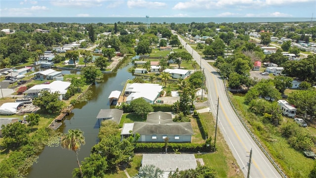 3102 SE 34th Ave, Okeechobee, FL 34974 - aerial perspective of suburban area featuring a nearby body of water