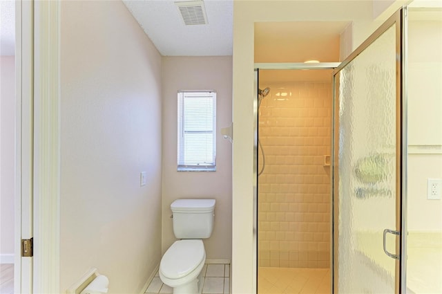 645 Liberty St, Englewood, FL 34223 - full bathroom with toilet, a shower stall, tile patterned flooring, and baseboards