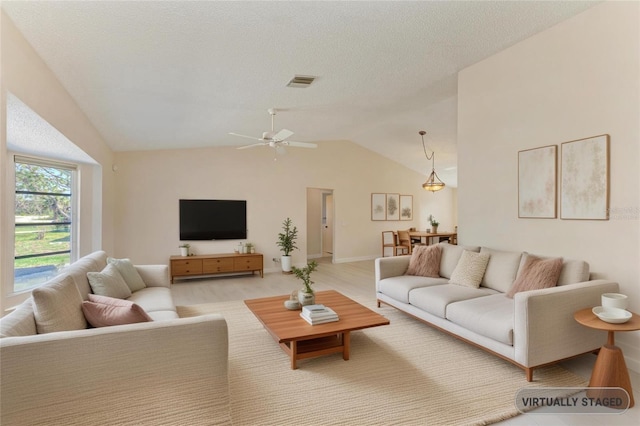645 Liberty St, Englewood, FL 34223 - living area featuring lofted ceiling and a ceiling fan