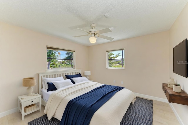 645 Liberty St, Englewood, FL 34223 - bedroom featuring a ceiling fan and light wood-style flooring