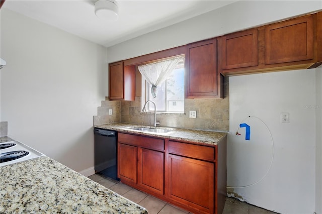 2704 Hidden Lake Blvd Unit C, Sarasota, FL 34237 - kitchen featuring black dishwasher, decorative backsplash, light stone countertops, and light tile patterned floors