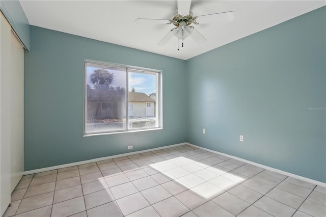 2704 Hidden Lake Blvd Unit C, Sarasota, FL 34237 - empty room featuring ceiling fan and light tile patterned floors