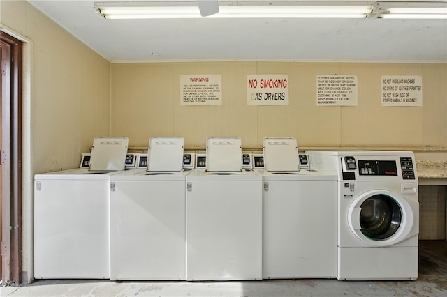 2704 Hidden Lake Blvd Unit C, Sarasota, FL 34237 - shared laundry room with washing machine and dryer