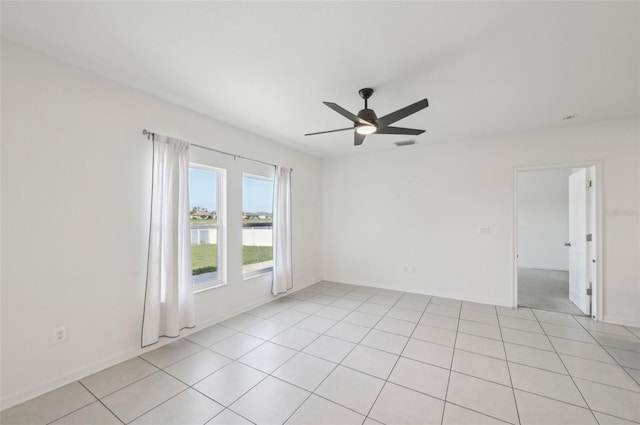 4503 Lindever Ln, Palmetto, FL 34221 - spare room with a ceiling fan, a water view, and light tile patterned floors