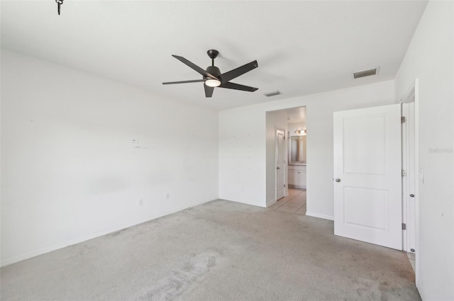 4503 Lindever Ln, Palmetto, FL 34221 - unfurnished bedroom featuring carpet floors, ensuite bathroom, ceiling fan, and baseboards