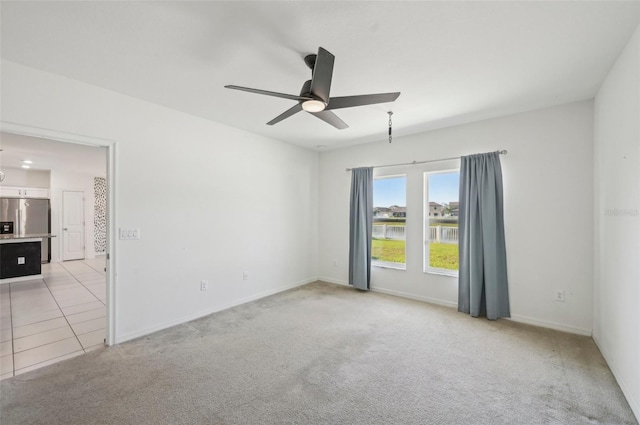 4503 Lindever Ln, Palmetto, FL 34221 - spare room with ceiling fan, light carpet, baseboards, and a water view