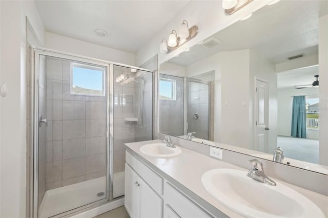 4503 Lindever Ln, Palmetto, FL 34221 - full bath with a shower stall, double vanity, and ceiling fan
