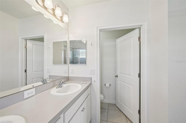4503 Lindever Ln, Palmetto, FL 34221 - bathroom featuring toilet, double vanity, and tile patterned flooring