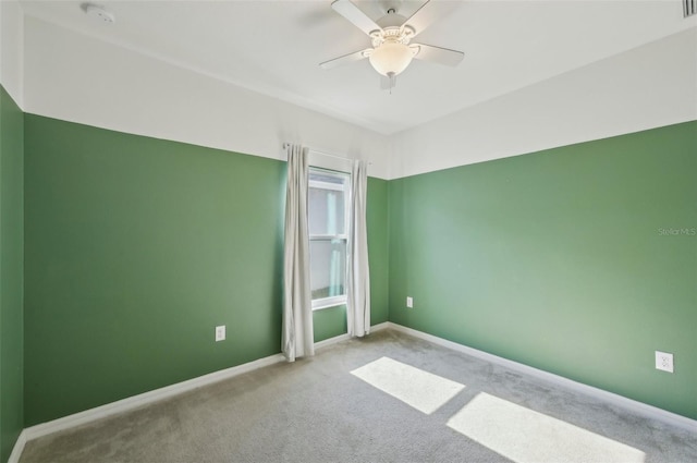 4503 Lindever Ln, Palmetto, FL 34221 - carpeted spare room with ceiling fan, baseboards, and a smoke detector