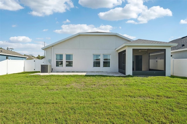 4503 Lindever Ln, Palmetto, FL 34221 - rear view of house featuring a sunroom, cooling unit, a patio area, and stucco siding