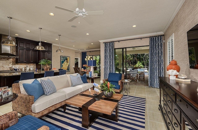 21225 Wacissa Dr, Venice, FL 34293 - living room with crown molding, recessed lighting, ceiling fan, and light tile patterned floors