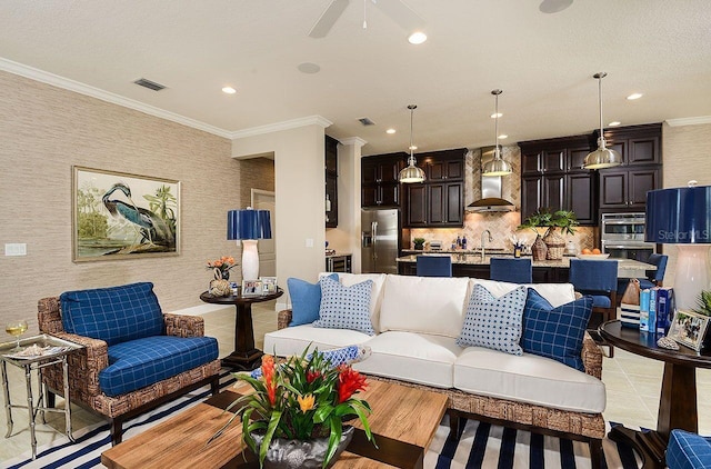 21225 Wacissa Dr, Venice, FL 34293 - living area with crown molding, recessed lighting, and ceiling fan