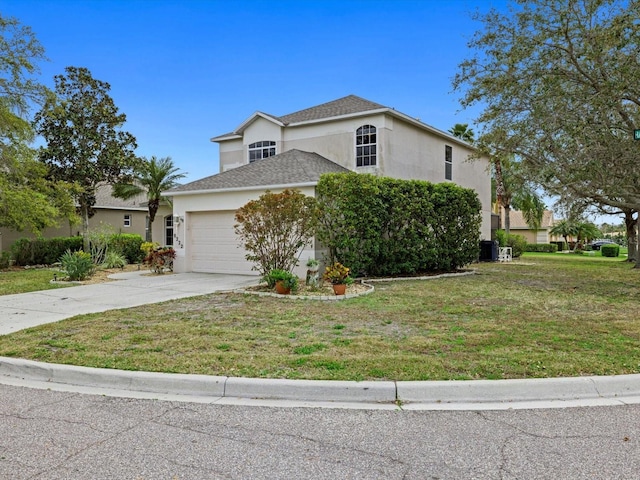 8222 Haven Harbour Way, Bradenton, FL 34212 - traditional-style house featuring stucco siding, driveway, a garage, and a front yard