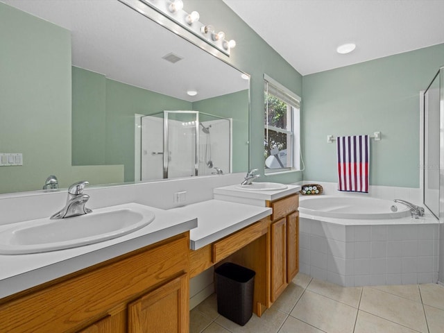 8222 Haven Harbour Way, Bradenton, FL 34212 - full bathroom featuring a stall shower, a garden tub, tile patterned flooring, and double vanity