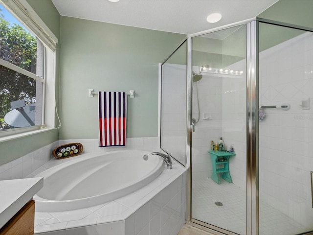 8222 Haven Harbour Way, Bradenton, FL 34212 - bathroom with a garden tub and a shower stall