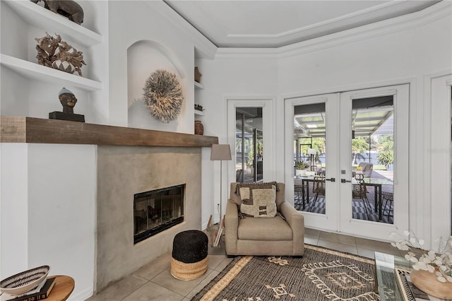 4505 Camino Real, Sarasota, FL 34231 - living area with tile patterned floors, french doors, plenty of natural light, and ornamental molding