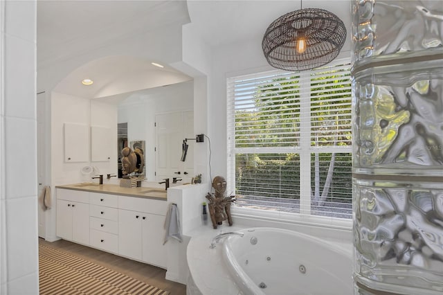 4505 Camino Real, Sarasota, FL 34231 - full bath featuring a whirlpool tub and double vanity