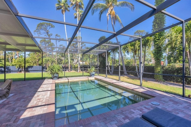 4505 Camino Real, Sarasota, FL 34231 - view of swimming pool featuring a patio and glass enclosure