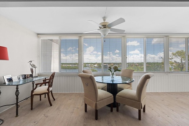 1255 E Peppertree Dr Unit 507, Sarasota, FL 34242 - dining space featuring plenty of natural light, light wood-style flooring, and a ceiling fan