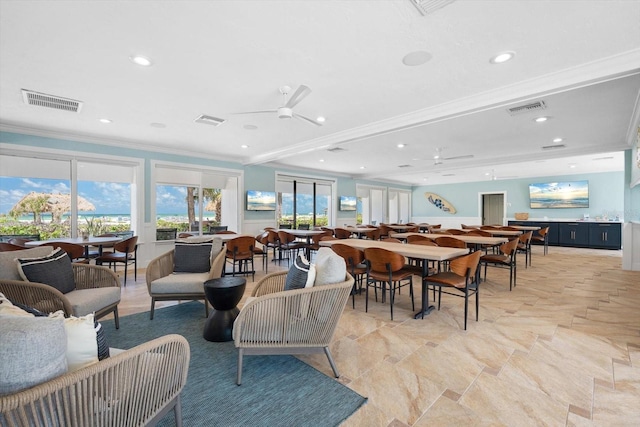 1255 E Peppertree Dr Unit 507, Sarasota, FL 34242 - living area with crown molding, recessed lighting, and ceiling fan