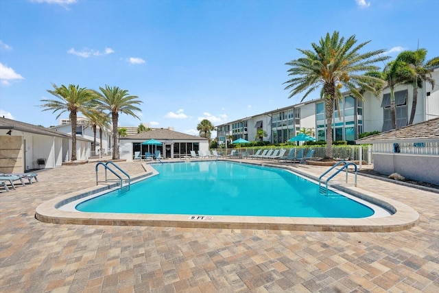 1255 E Peppertree Dr Unit 507, Sarasota, FL 34242 - community pool featuring a patio area