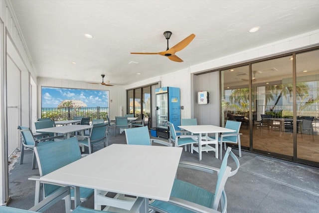 1255 E Peppertree Dr Unit 507, Sarasota, FL 34242 - sunroom / solarium featuring outdoor dining area and a ceiling fan