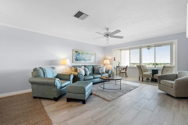 1255 E Peppertree Dr Unit 507, Sarasota, FL 34242 - living room with ceiling fan, light wood finished floors, and baseboards