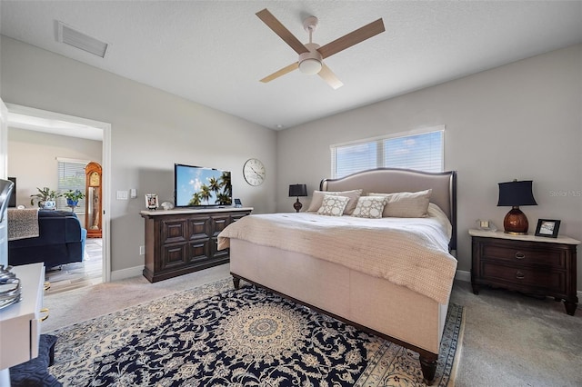 2625 Star Apple Way, Sarasota, FL 34240 - bedroom featuring light colored carpet, baseboards, and a ceiling fan