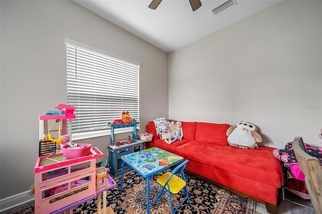 2625 Star Apple Way, Sarasota, FL 34240 - living area featuring a ceiling fan