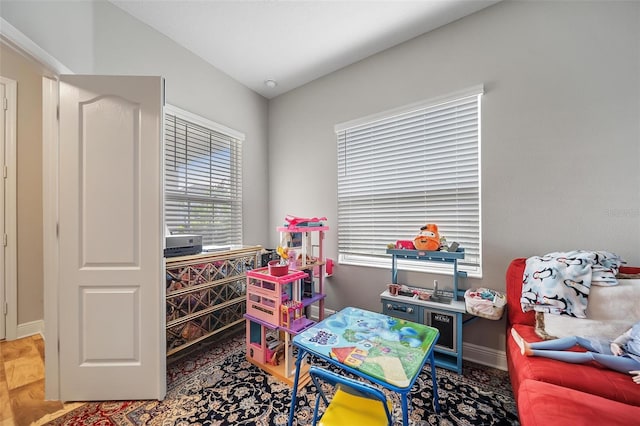 2625 Star Apple Way, Sarasota, FL 34240 - playroom featuring healthy amount of natural light, lofted ceiling, and baseboards
