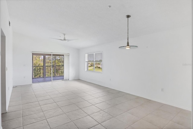 9630 Club S Cir Unit 6303, Sarasota, FL 34238 - empty room with a ceiling fan and light tile patterned floors
