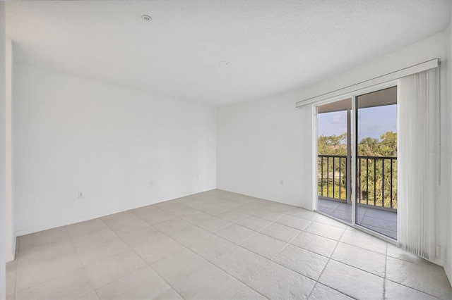 9630 Club S Cir Unit 6303, Sarasota, FL 34238 - unfurnished room with light tile patterned flooring