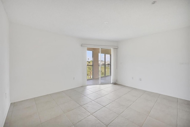 9630 Club S Cir Unit 6303, Sarasota, FL 34238 - empty room featuring light tile patterned floors
