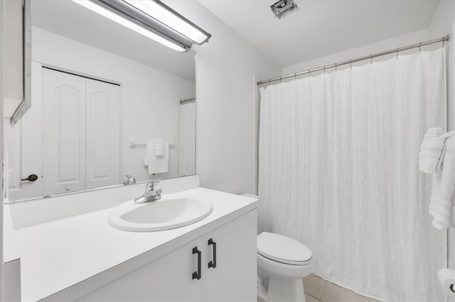 9630 Club S Cir Unit 6303, Sarasota, FL 34238 - bathroom featuring vanity, toilet, and tile patterned flooring