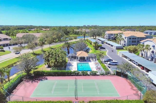 9630 Club S Cir Unit 6303, Sarasota, FL 34238 - drone / aerial view of a pool area and a nearby body of water